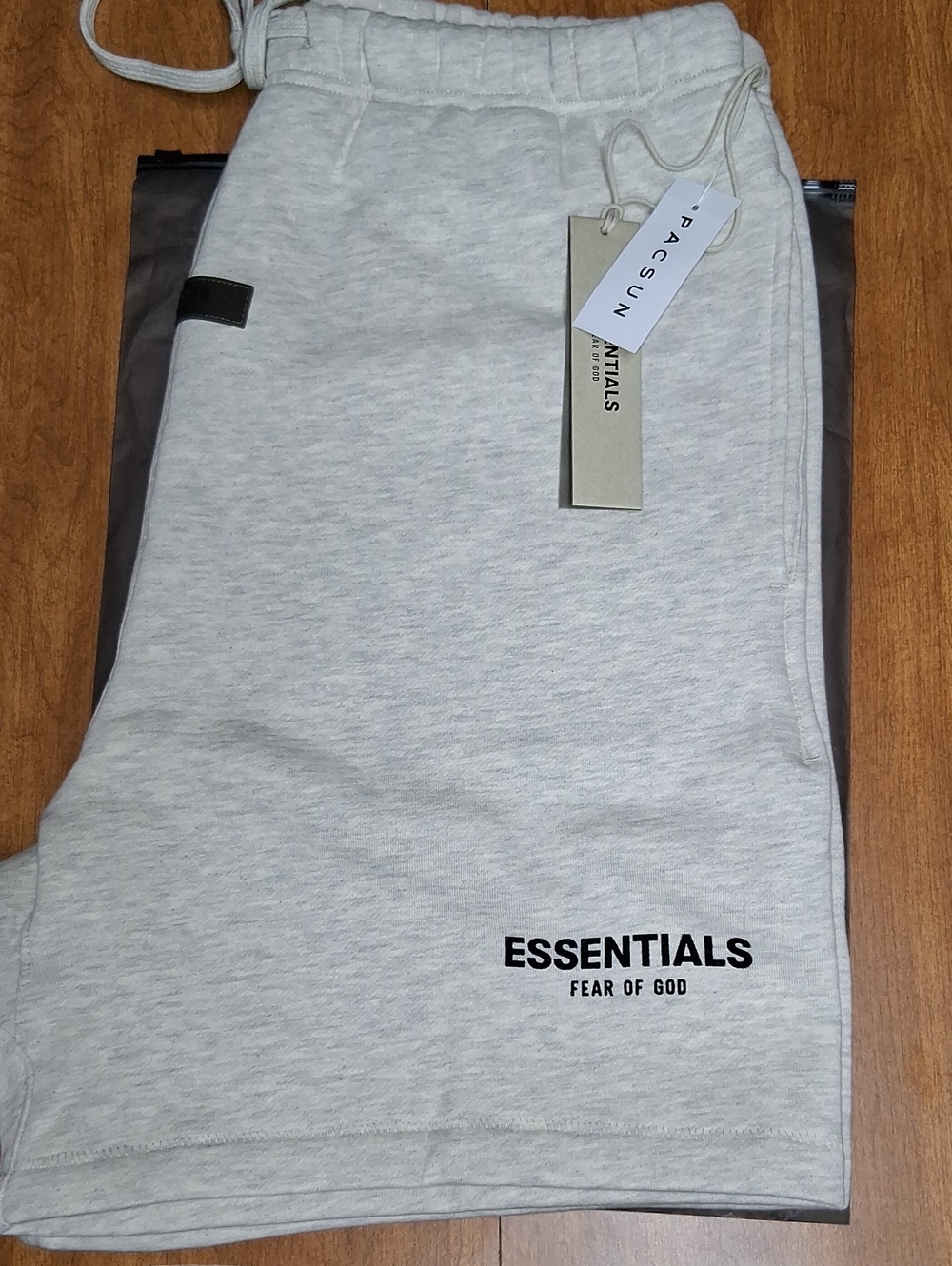 Fear of God Essentials Light Oatmeal Sweat Shorts